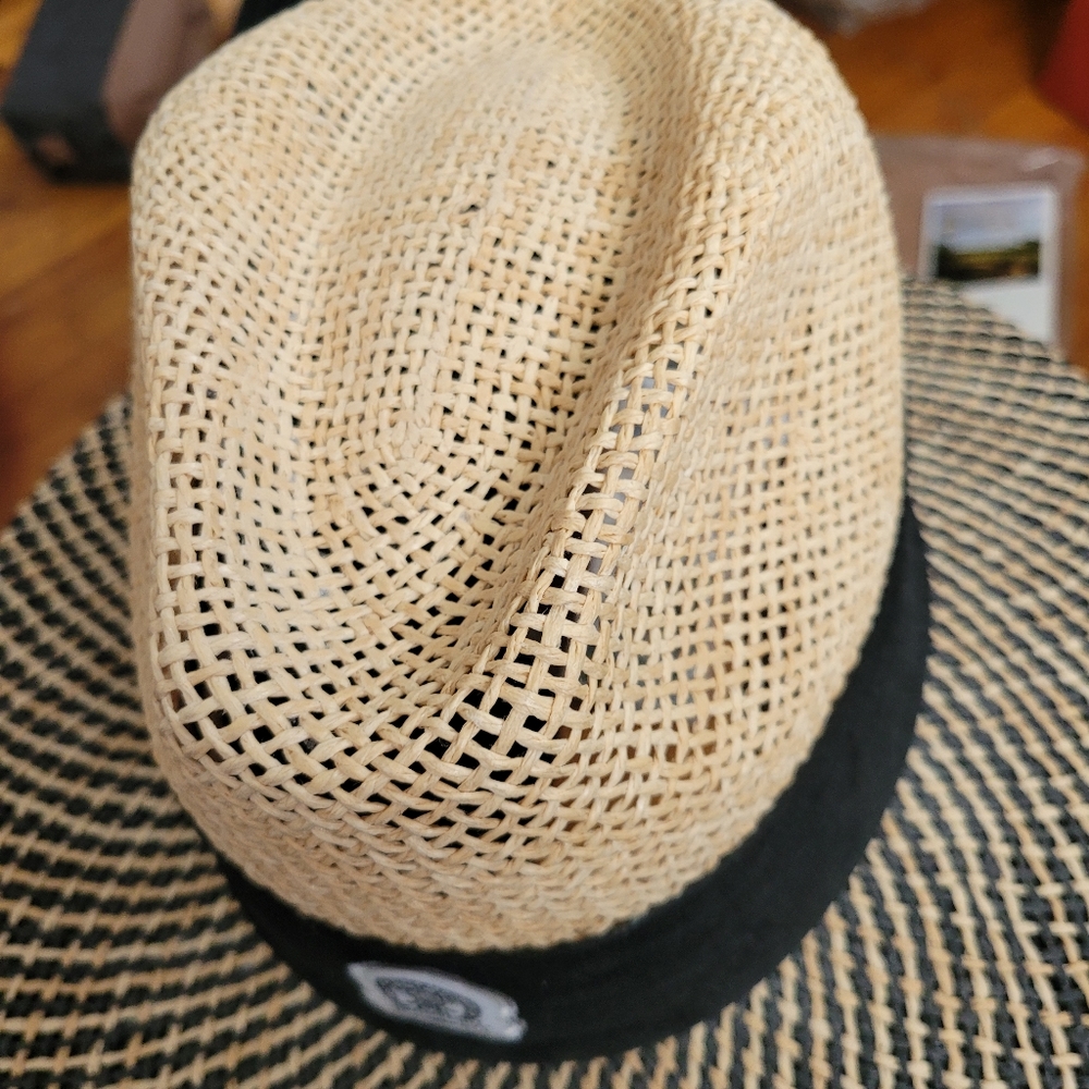 PGA Tour golf hat.